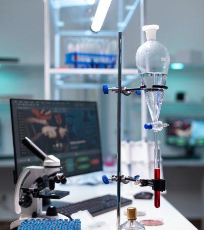 Science laboratory equipment and test tube with blood